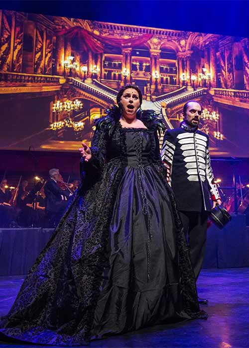 Raoul with Mme Giry in Masquerade staged in Iceland at the Harpa Theatre.